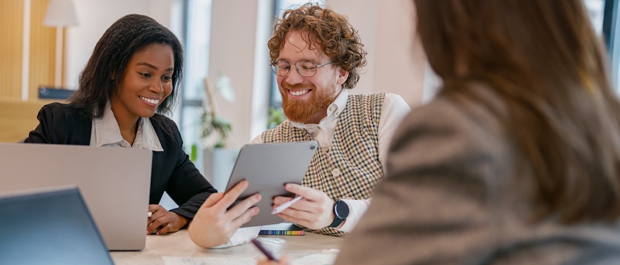 3 coworkers excited about on-page seo improvements leading to increased demo requests